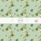 Sage green fabric by the yard with green clovers and gold dispersed stars 