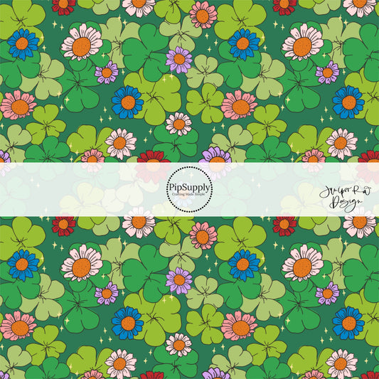 Dark green fabric by the yard with green clovers and colorful floral designs