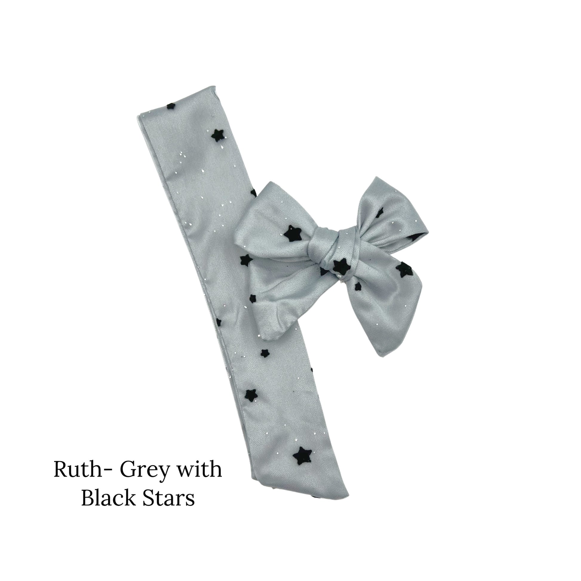 Small grey bow with black stars 