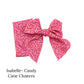 Christmas design multi colored bow with Candy canes and stars