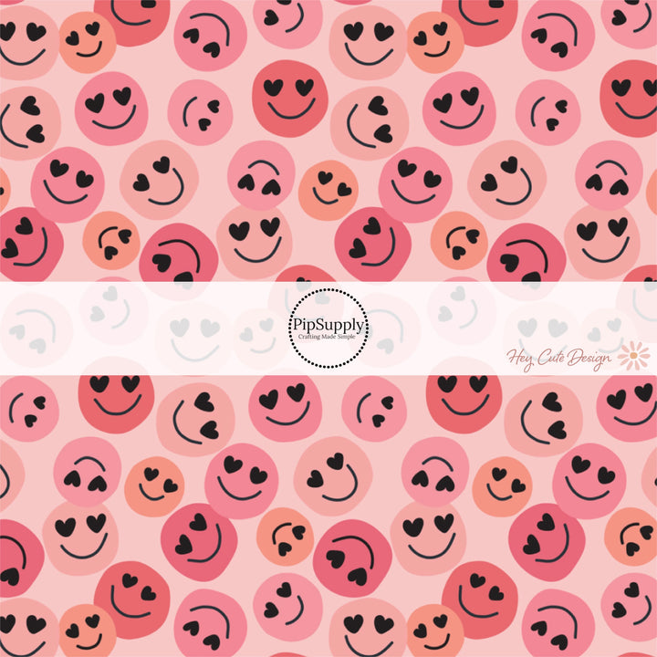 Pink fabric by the yard with pink and peach heart eye smiley faces 