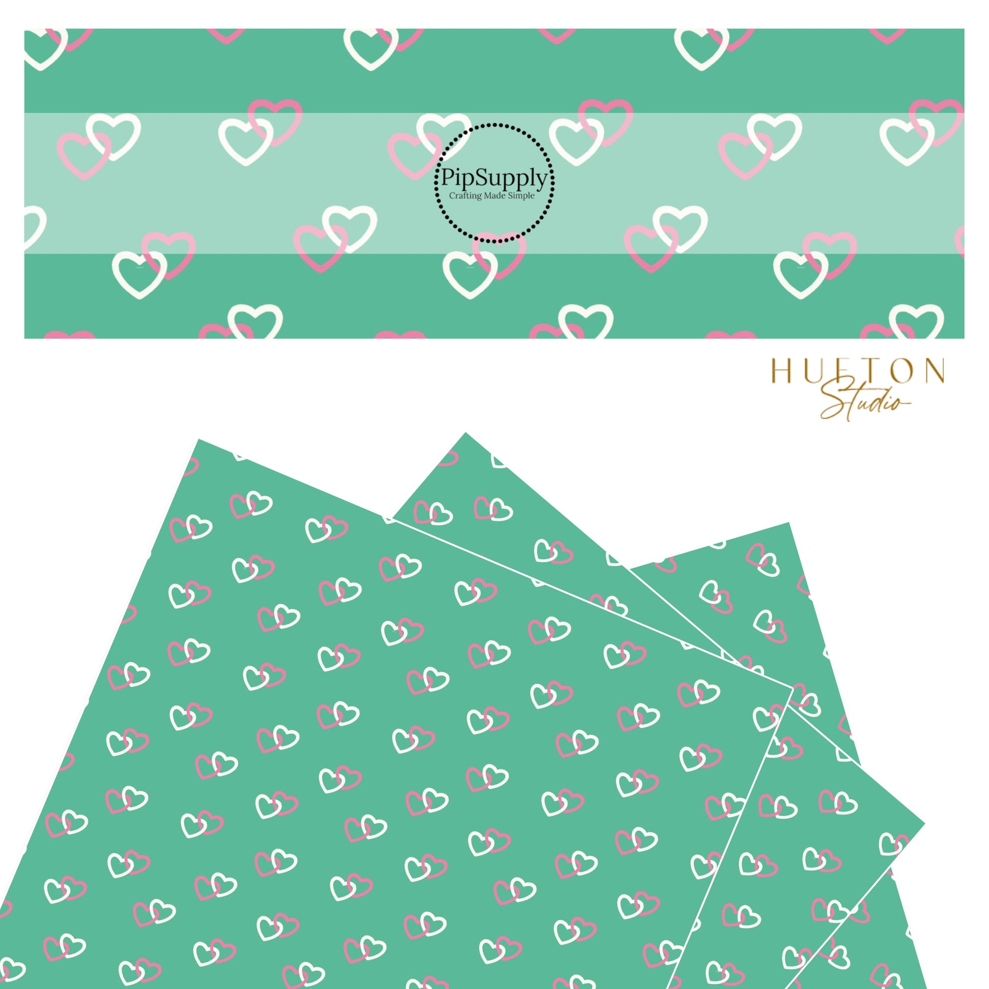 White and hot pink interlocked hearts on sea green faux leather sheets