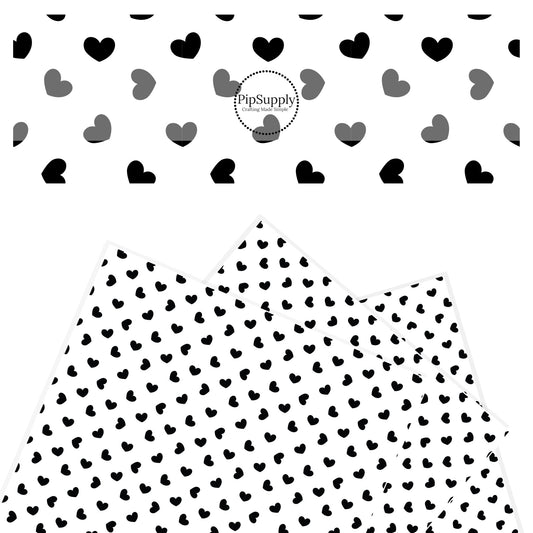 Scattered black hearts on white faux leather sheets