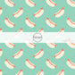 Mint green fabric by the yard with scattered hot dogs