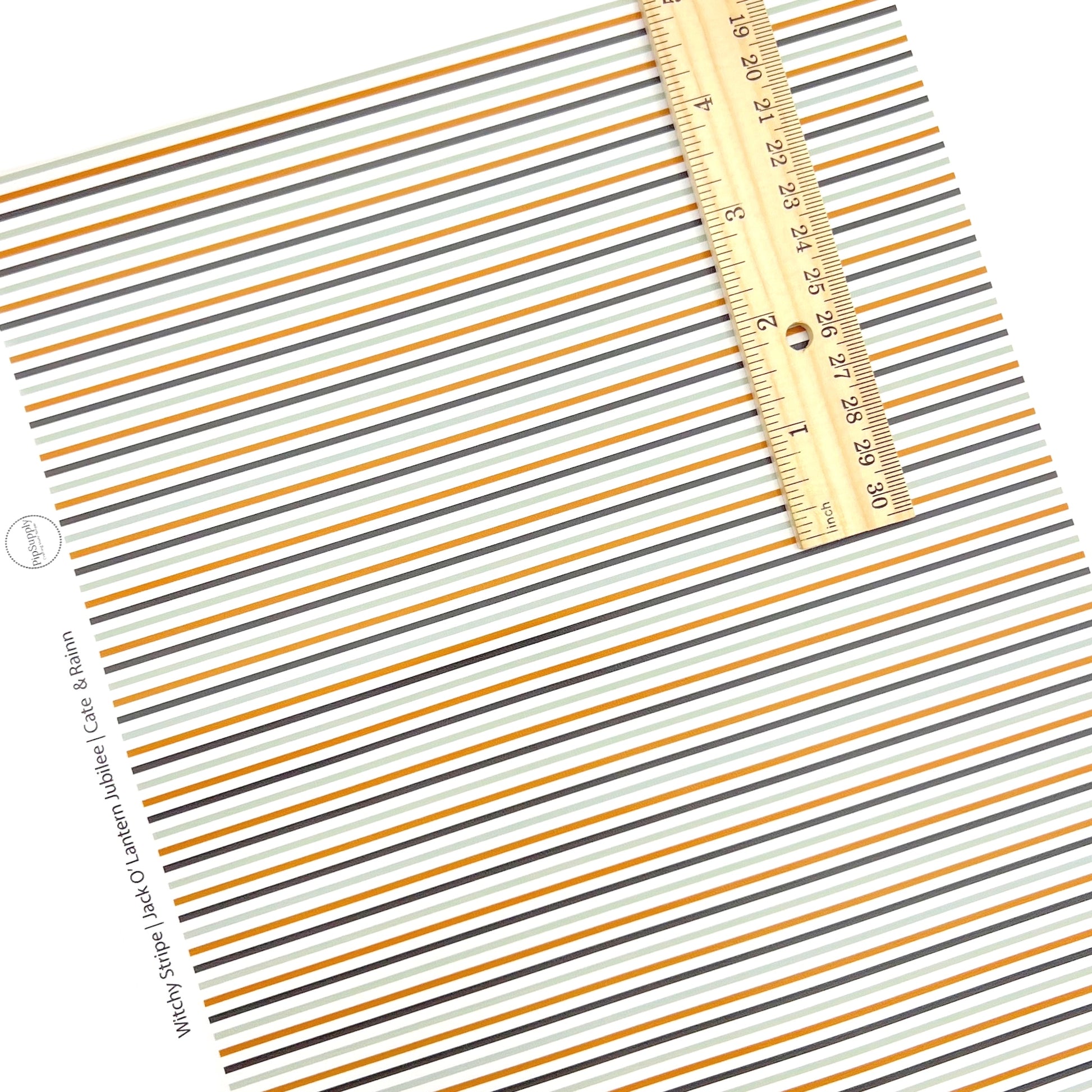 Orange, navy, and light blue stripes on white faux leather sheet