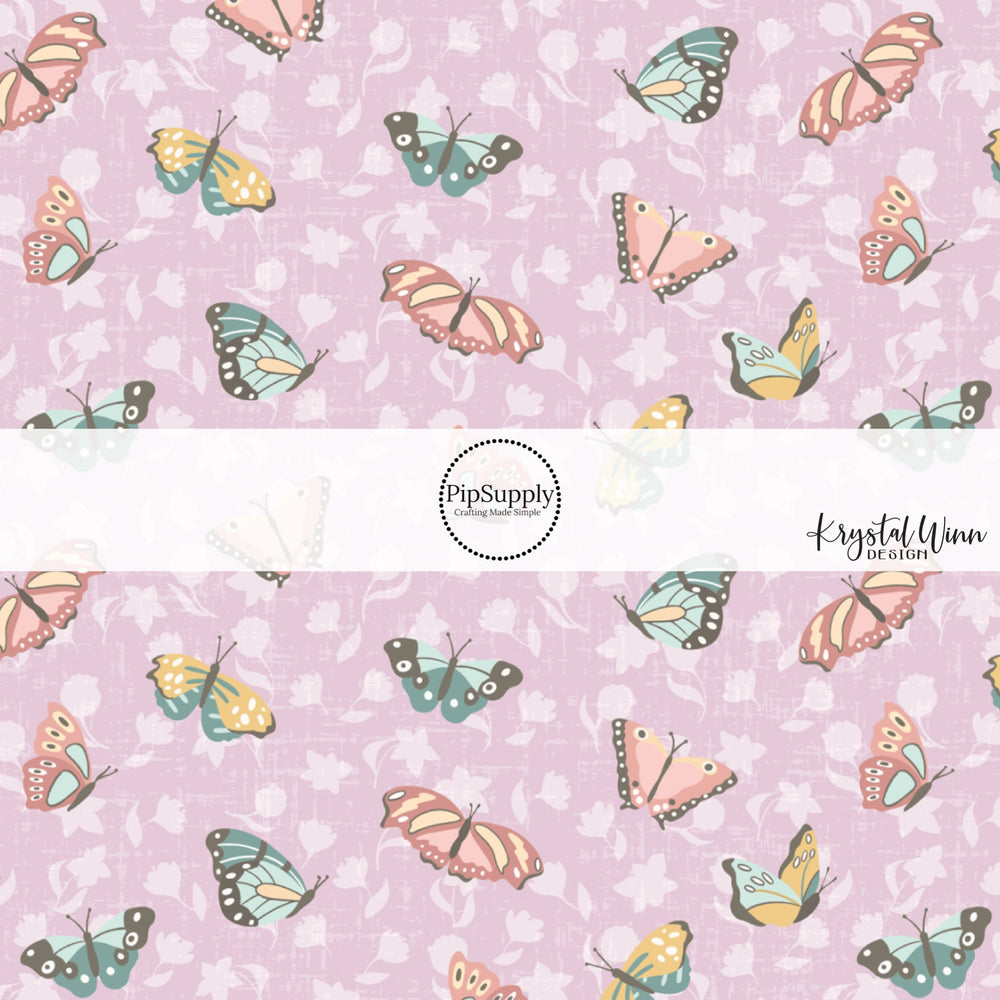 pink, blue, yellow butterflies with purple flowers on a lavender bow strip