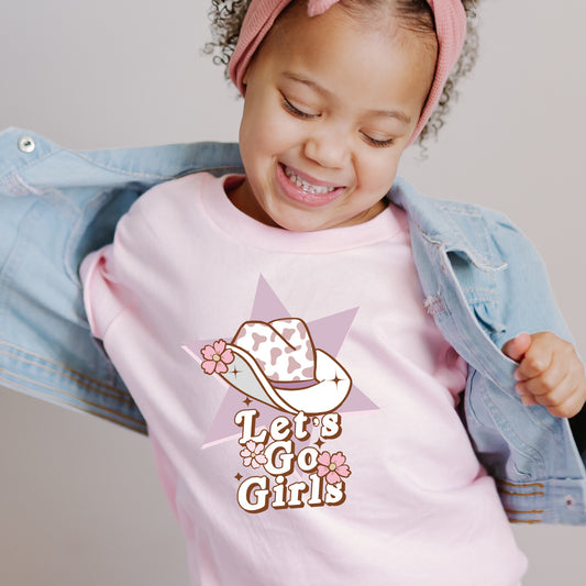 Cow print cowgirl hat and the phrase "Let's Go Girls"  iron on heat transfer.