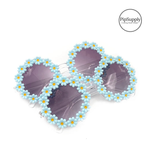 Light blue daisies with yellow center sunglasses