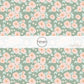 Light peach and cream flowers on sage green fabric by the yard.