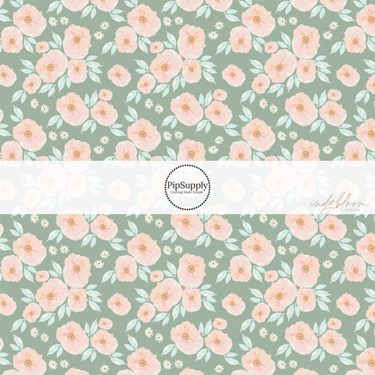 Light peach and cream flowers on sage green fabric by the yard.