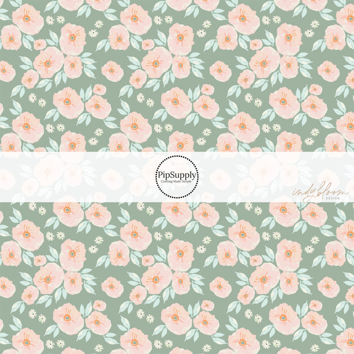 Light peach and cream flowers on sage green fabric by the yard.