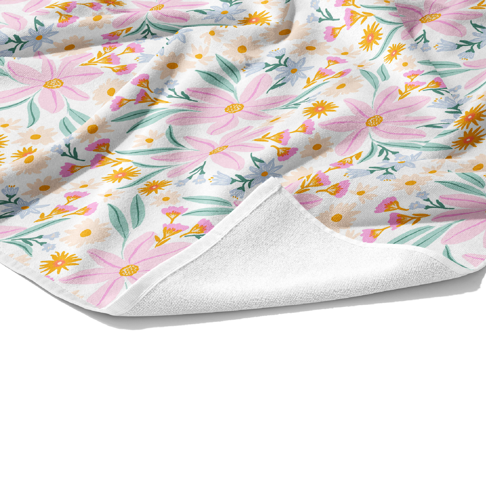 Plush white cotton personalized beach towel with light pink, golden yellow, cream, and powder blue wildflowers on front.