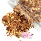 Spilling bag of copper metallic chunky glitter and fine glitter mix.