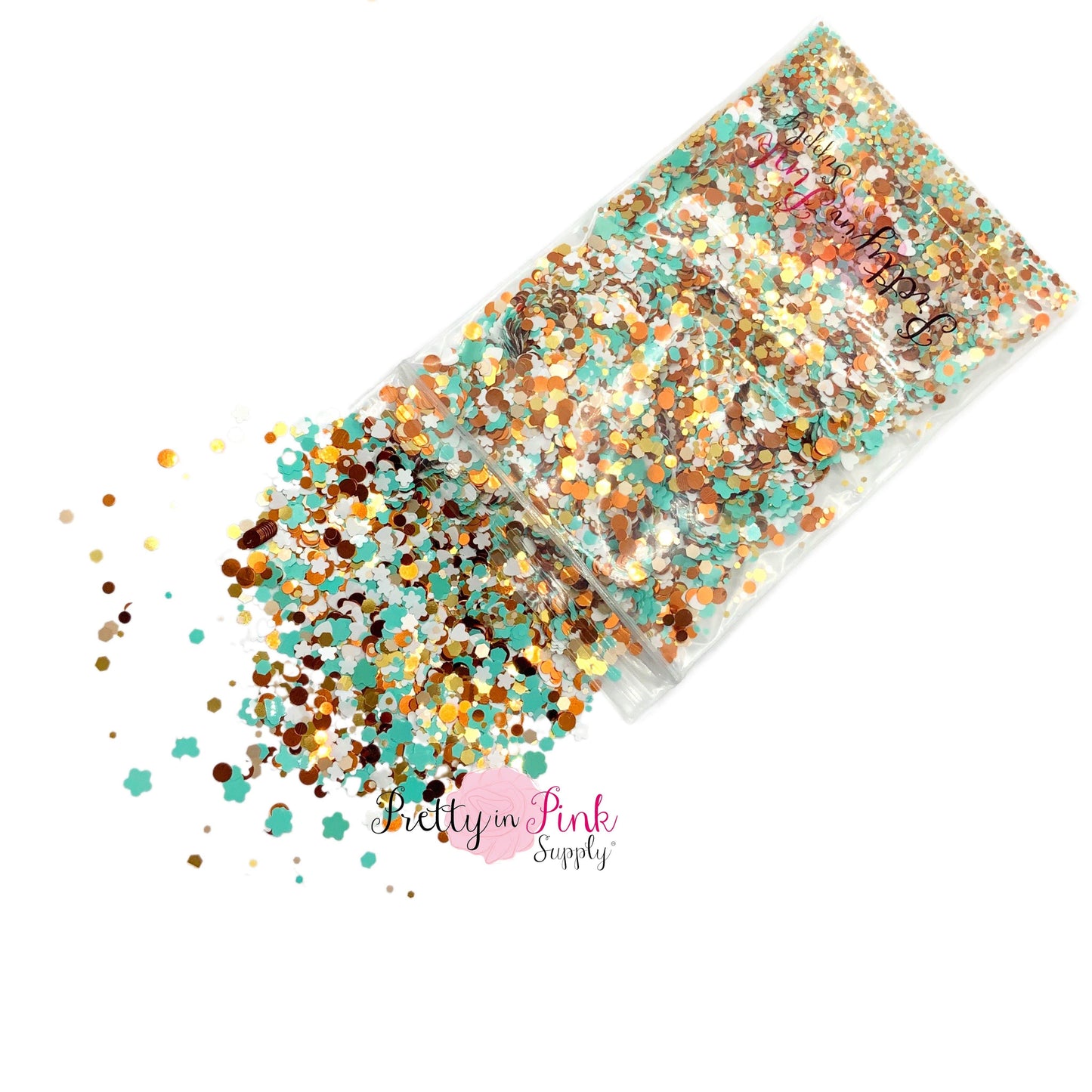 Spilling bag of light aqua, gold, and white chunky/fine glitter with flower shapes.