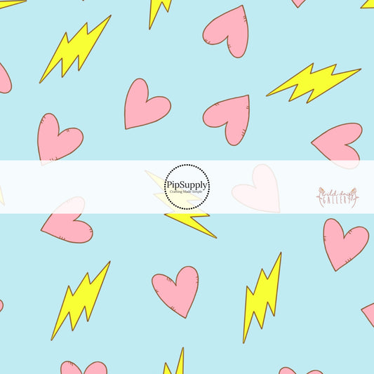 Blue Pattern with pink hearts and yellow lighting bolts on fabric