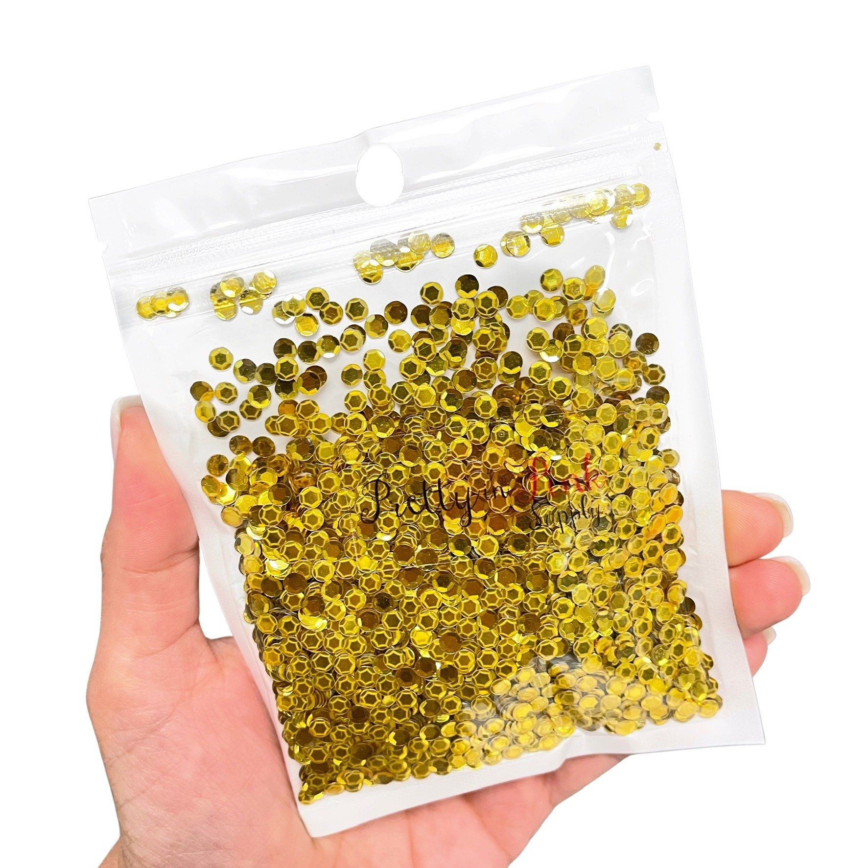 Resealable bag of St. Patrick's Day gold coin metallic sequin glitter.