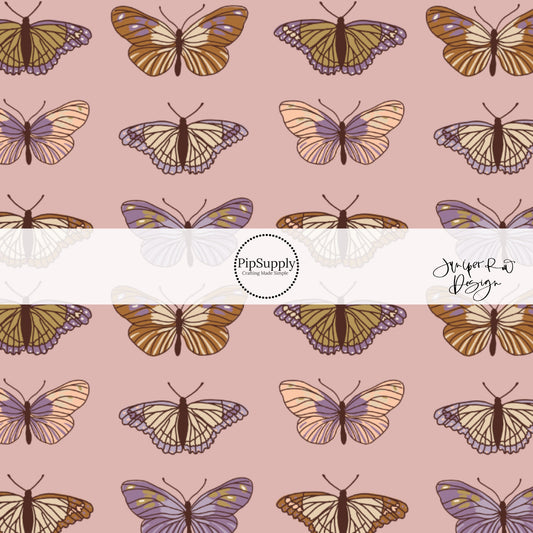 monarch butterflies on mauve fabric by the yard 