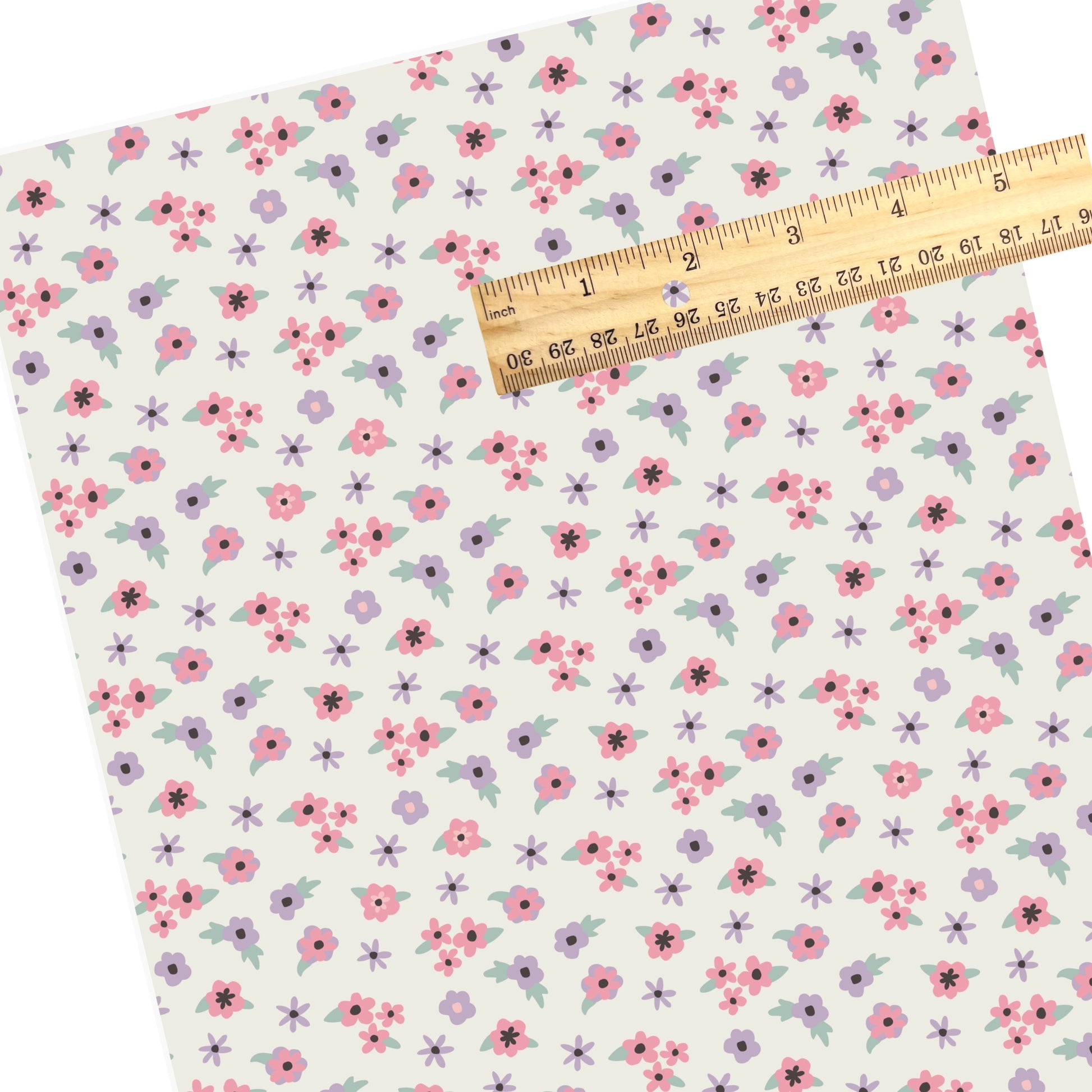 Pastel pink and purple floral mix pattern faux leather sheet.
