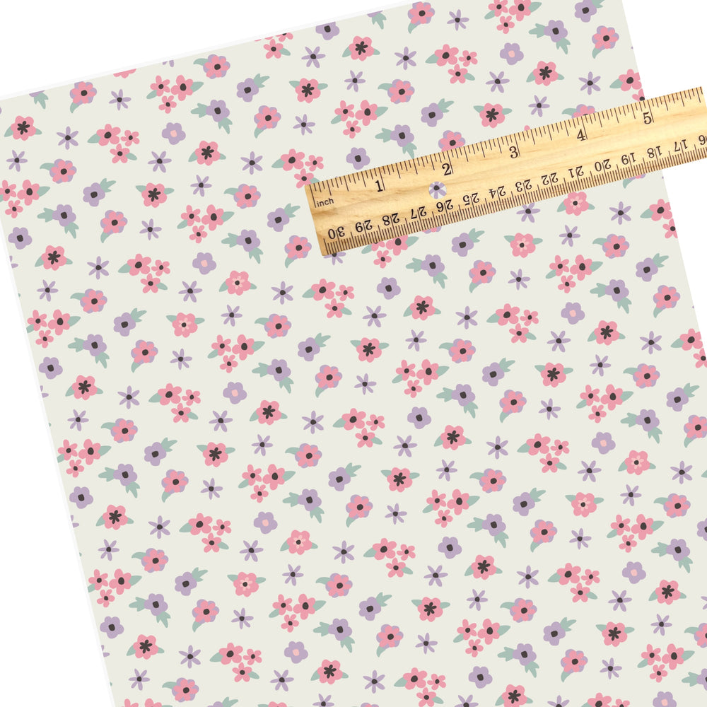 Pastel pink and purple floral mix pattern faux leather sheet.