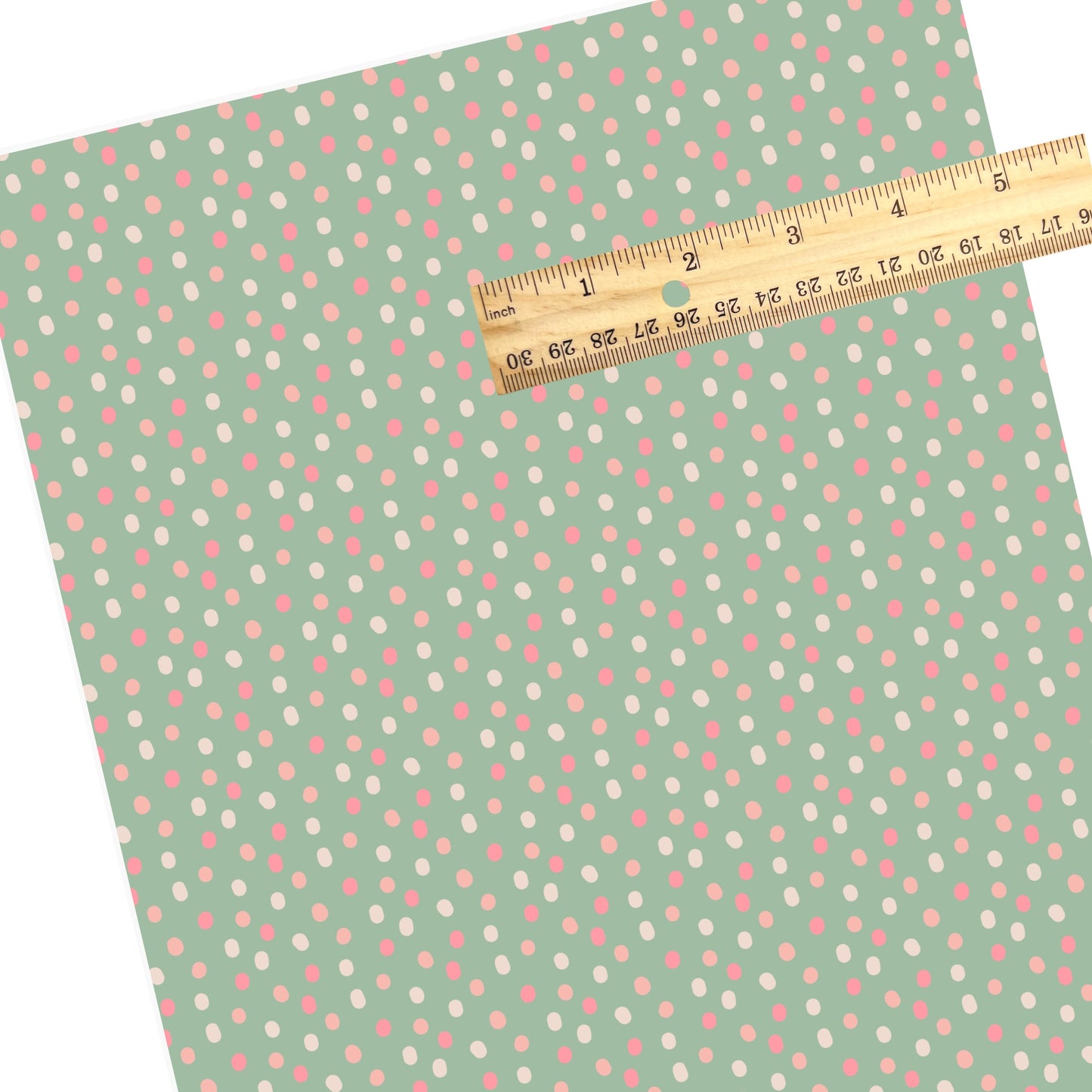 Mint green pattern with multicolored dots faux leather sheet.