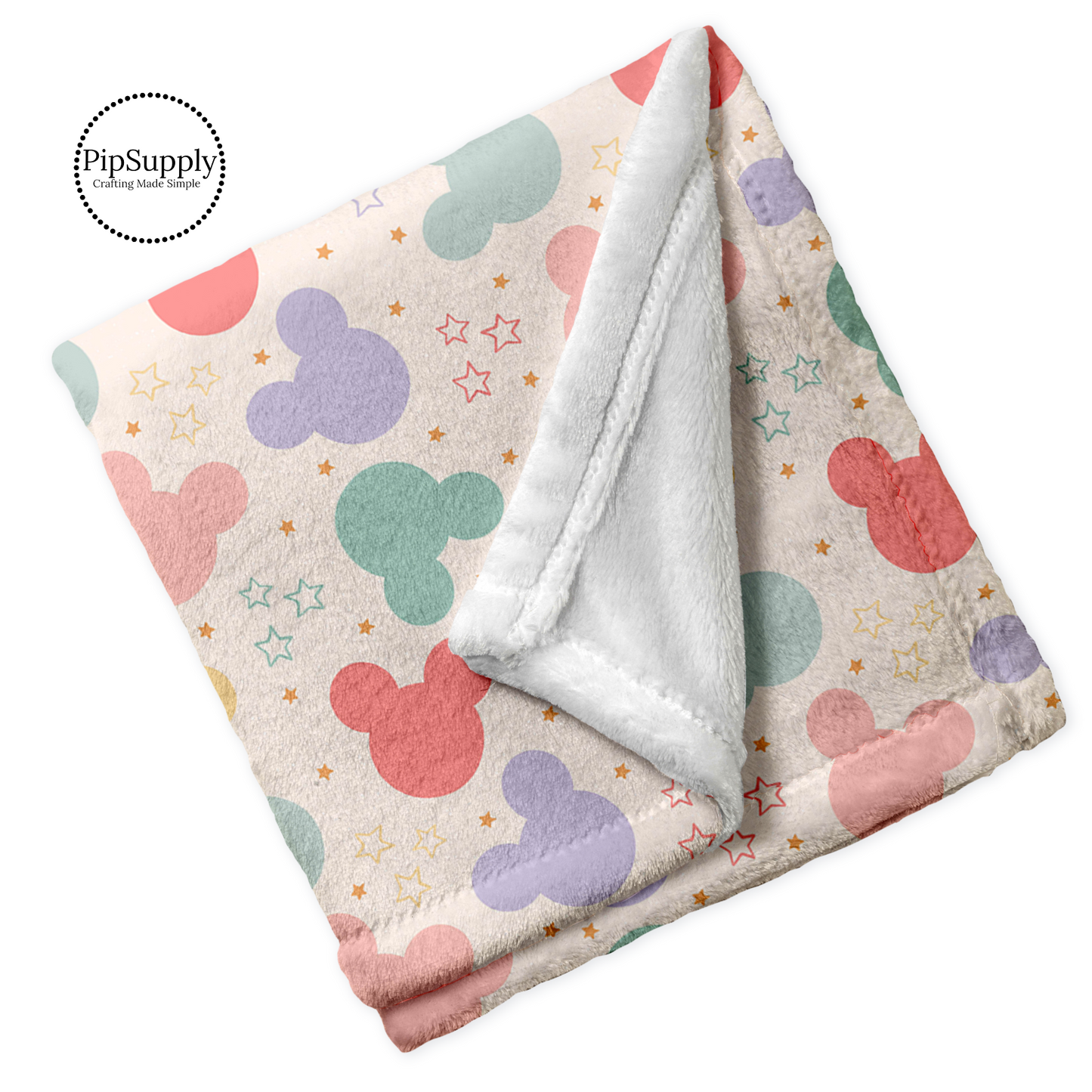 Soft minky blanket with magical stars and pastel mouse ear pattern.