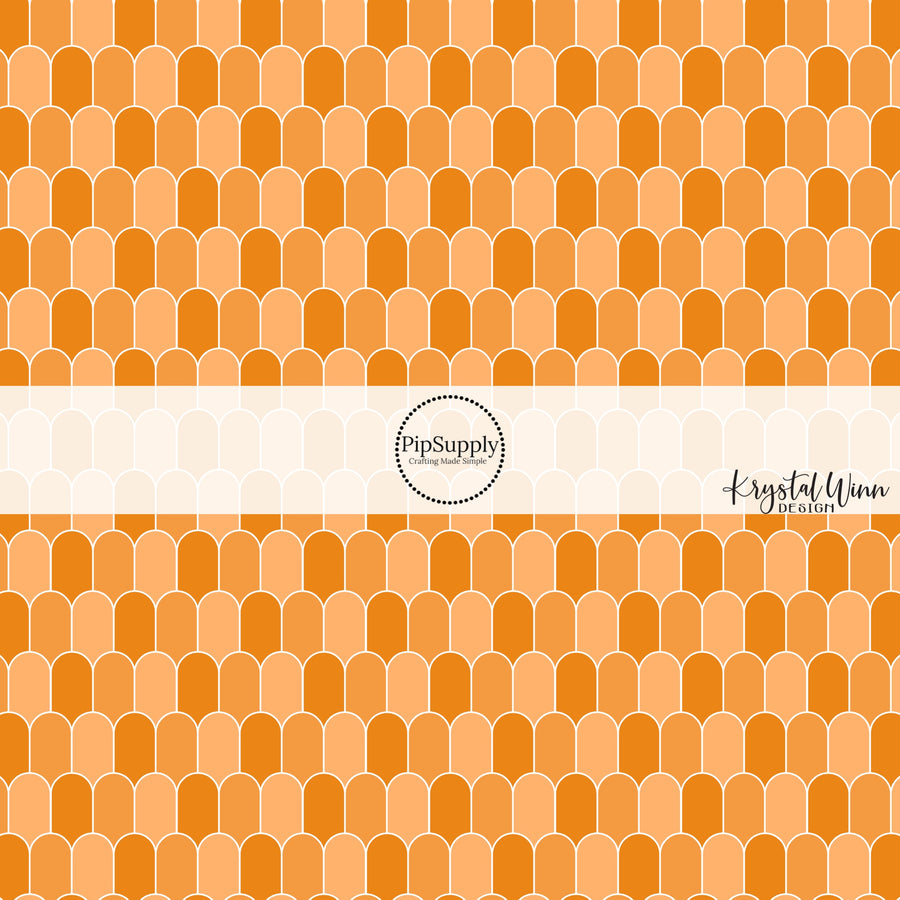 White outlined orange multi arches fabric by the yard