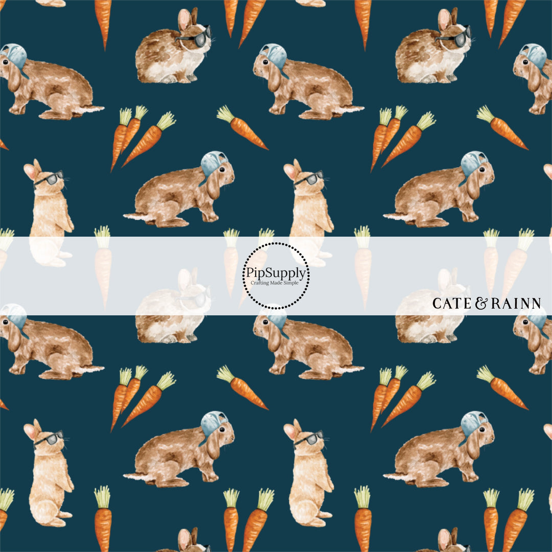 Blue fabric by the yard with orange carrots and bunny rabbits wearing baseball hats - Easter Patterned Fabric by the Yard 