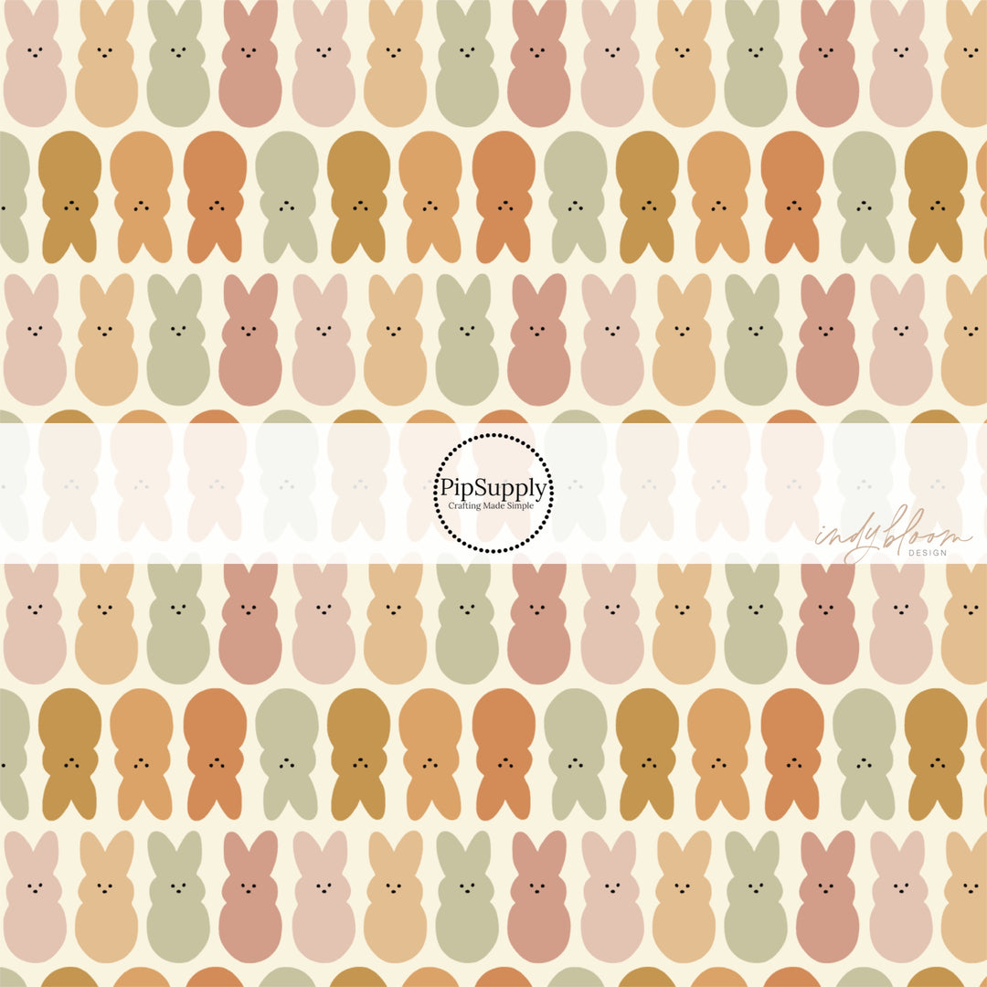 Cream fabric by the yard with neutral colored Bunnies.