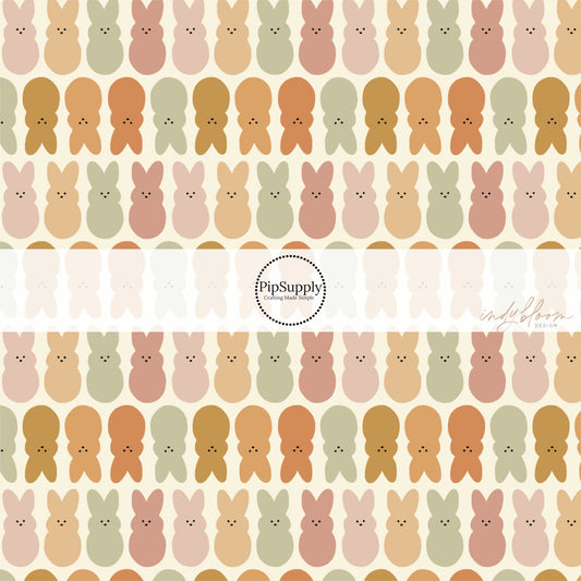 Cream fabric by the yard with neutral colored Bunnies.