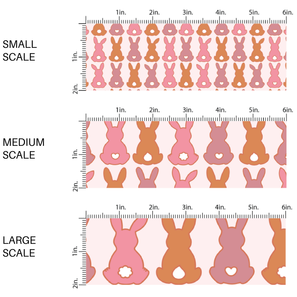 Light pink fabric by the yard with a scaled image guide with pink and orange bunnies with heart shaped tails - Spring Easter Fabric 