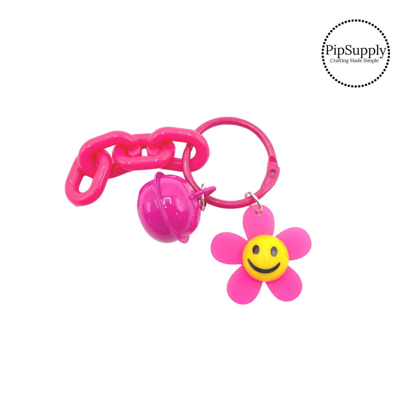 Pink flower with bell and linked chain keychain