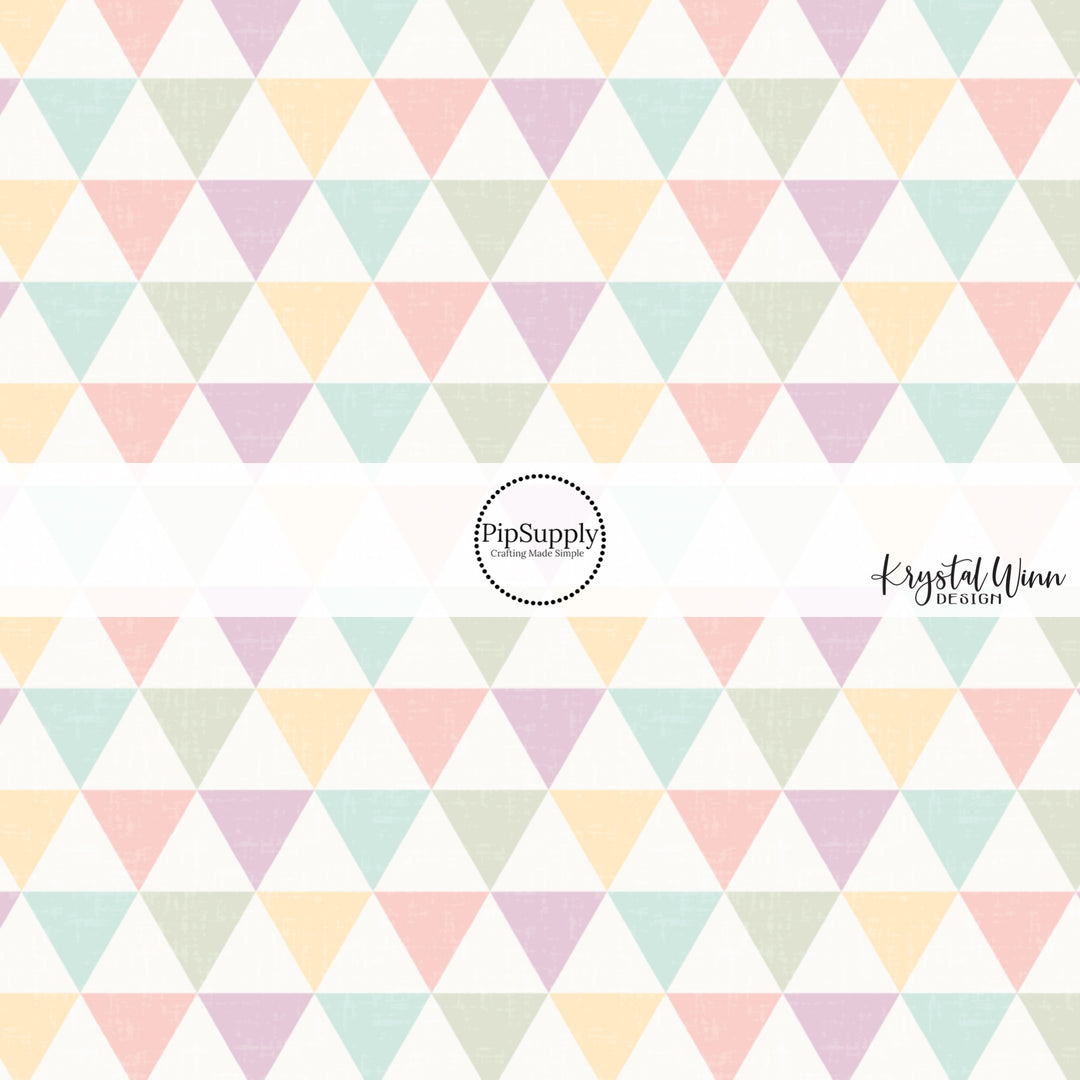 Cream fabric by the yard with pastel yellow, pink, blue, green, and purple triangle cones