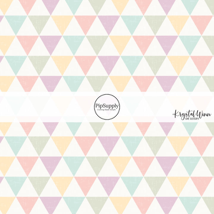 Cream fabric by the yard with pastel yellow, pink, blue, green, and purple triangle cones