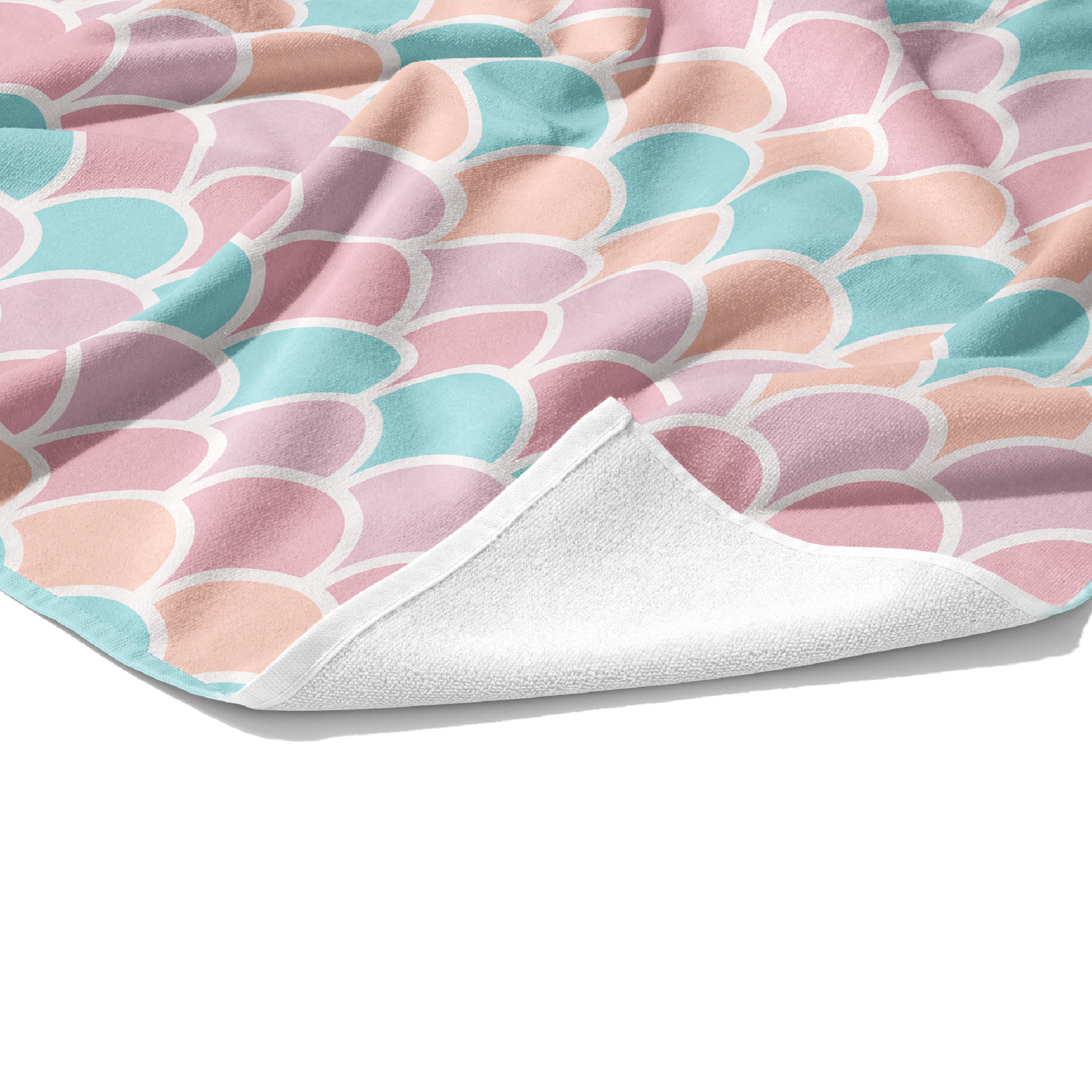 Plush white cotton towel with pink, coral, aqua, and orange print on the front.