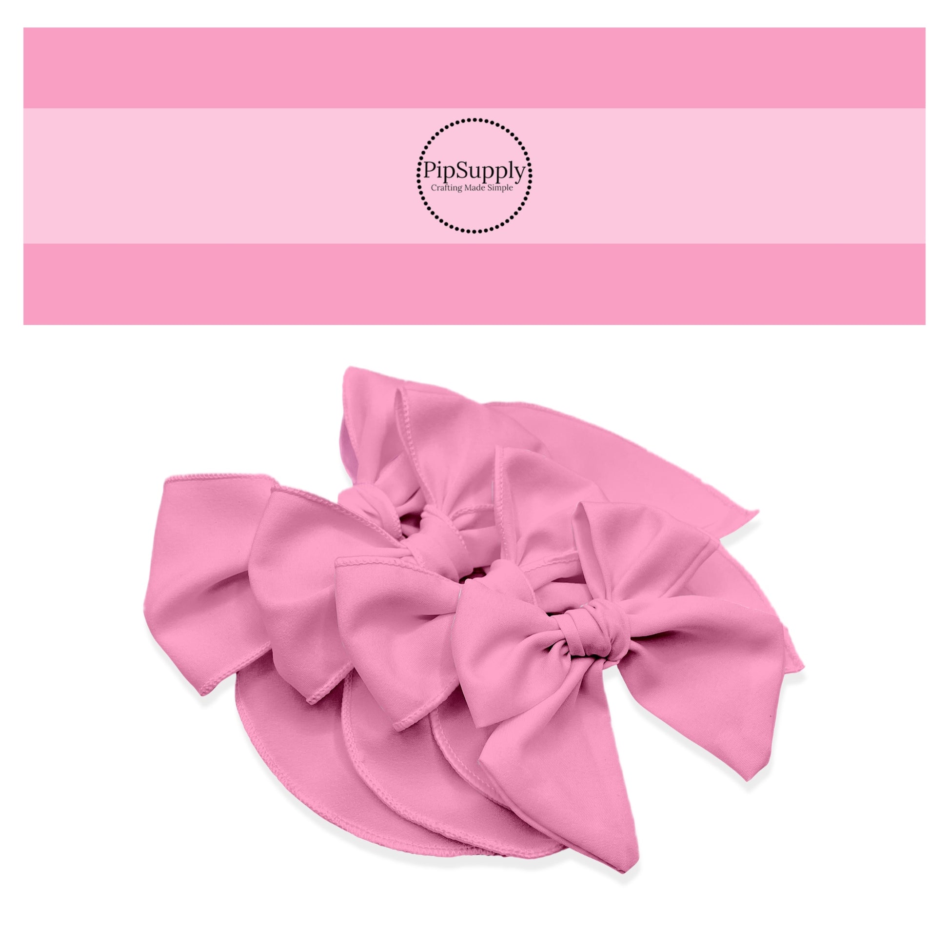 Light bubble pink solid colored hair bows.