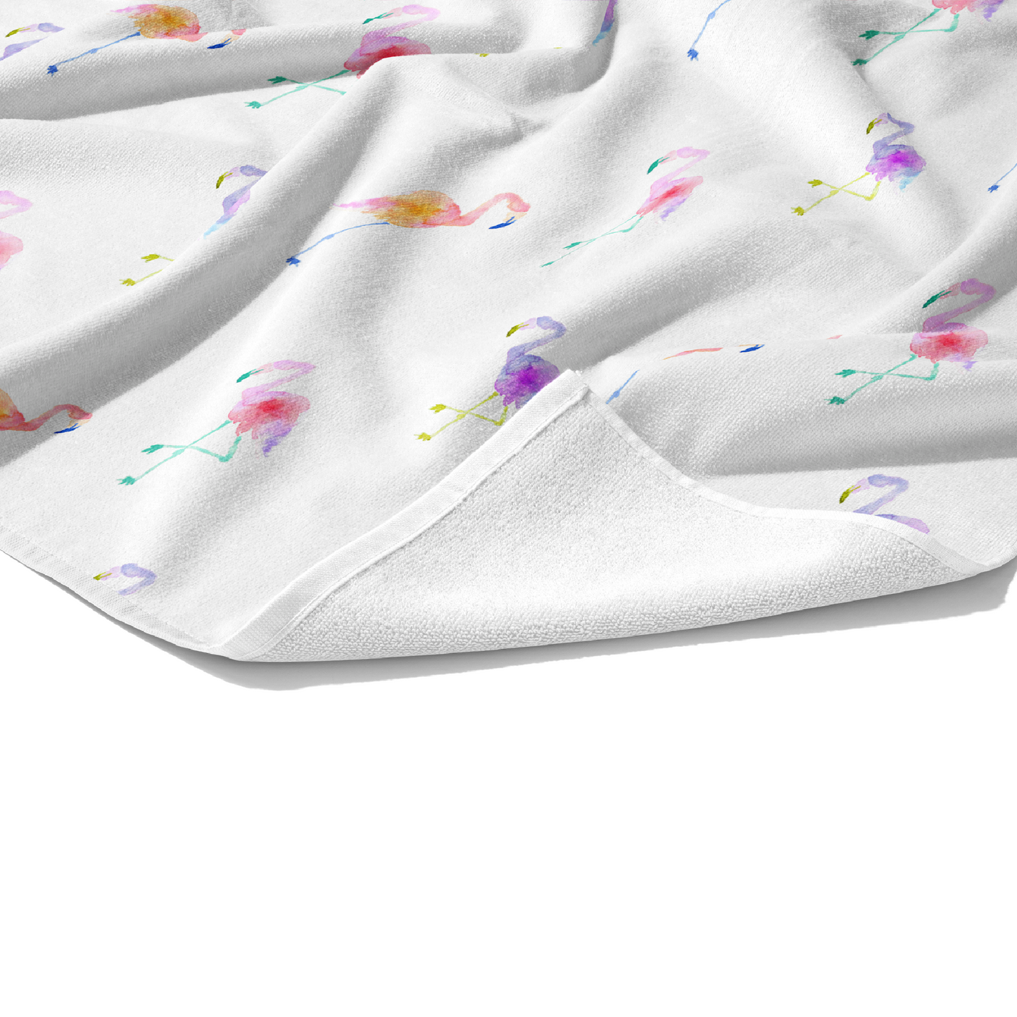 Plush white cotton towel with bright purple, pink, orange, yellow. and green tropical flamingos on white print on the front.