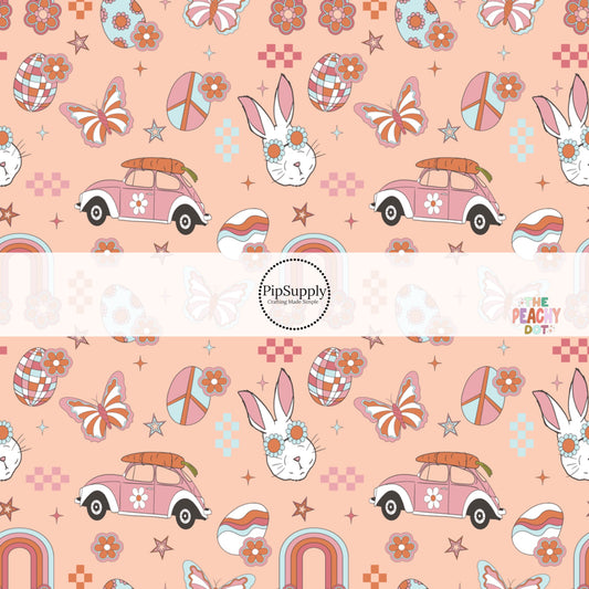 Easter bunnies, cars, Easter eggs, and butterflies on peach fabric by the yard