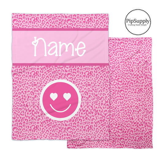 Hot pink and Light pink leopard print patterned soft minky blanket with smiley face and customizable text.
