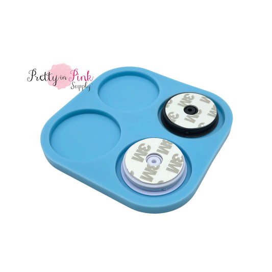 Blue circle silicone mold with circle phone pop hand grip hardware for customizable phone girip.