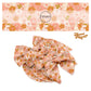 Rust and pink flowers with white bunnies on a pink bow strip