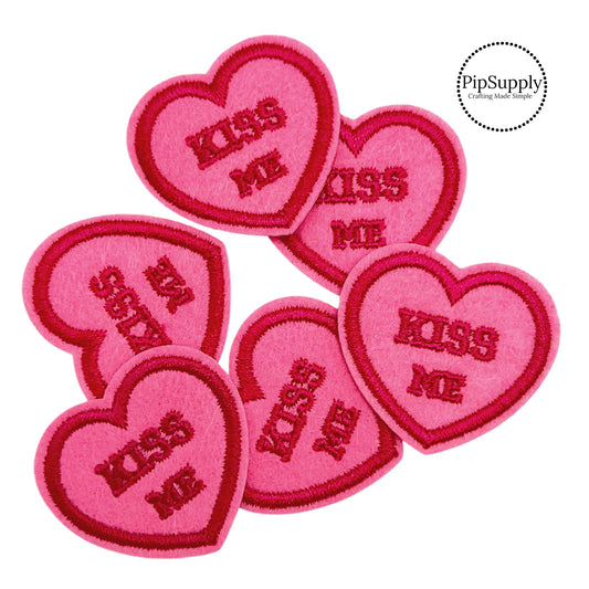 Heart shaped pink and red valentine's day chenille iron on patch with the words "Kiss Me"