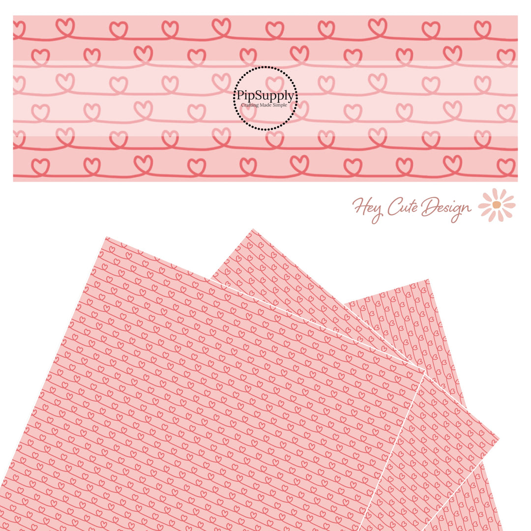 Pink hearts in a line drawing on pink faux leather sheet