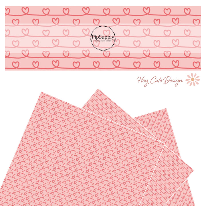 Pink hearts in a line drawing on pink faux leather sheet