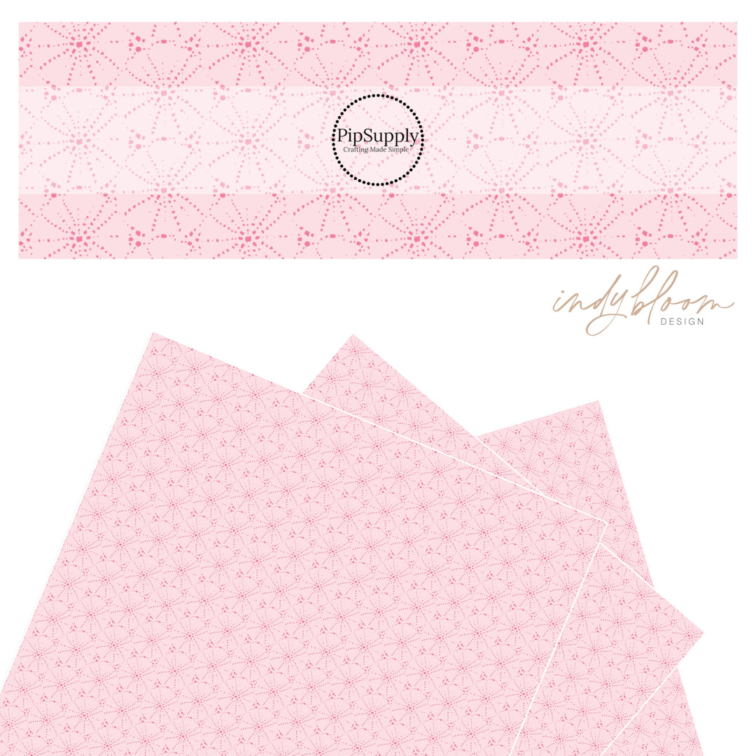 Dark pink sand dollars on light pink faux leather sheet.