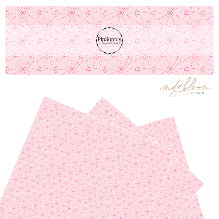 Dark pink sand dollars on light pink faux leather sheet.