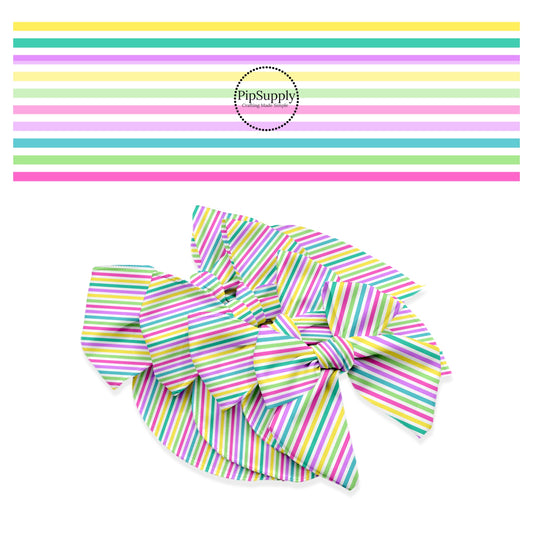 Pink, purple, yellow, and green horizontal stripes on white bow strips