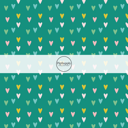 Tiny pink, green, and blue hearts on teal bow strip