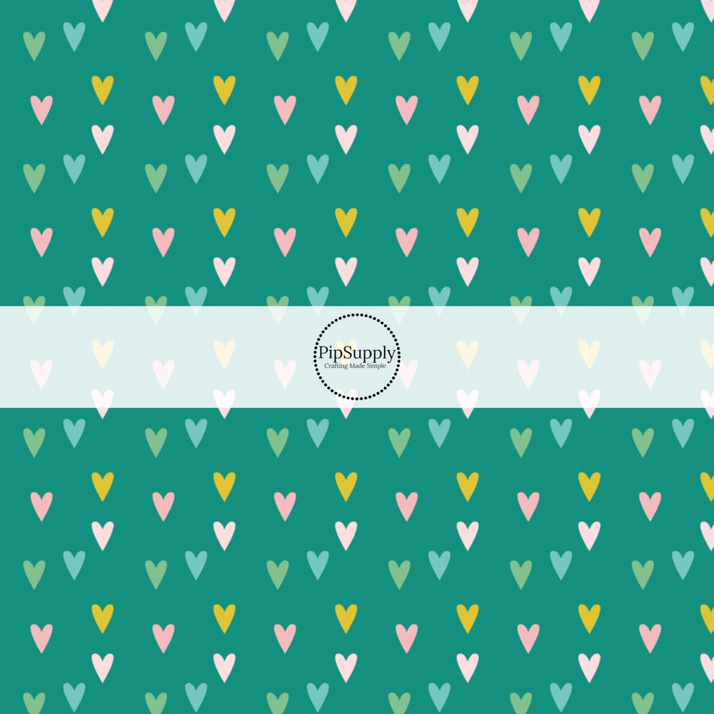 Tiny pink, green, and blue hearts on teal bow strip