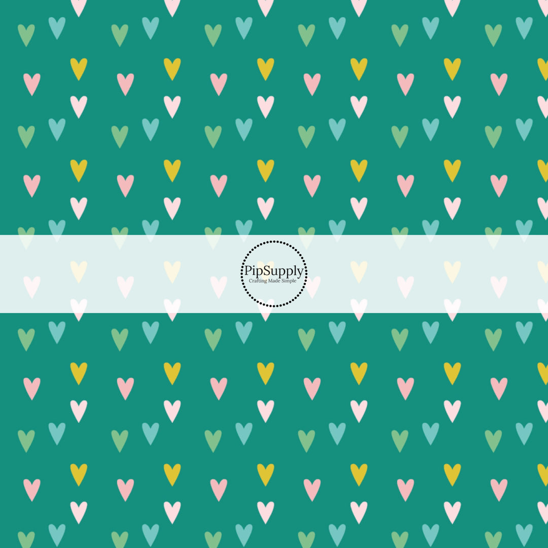 Tiny pink, green, and blue hearts on teal bow strip