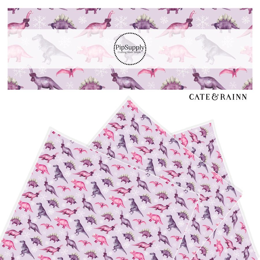 various dinosaurs in pink and purple faux leather sheet with snowflakes